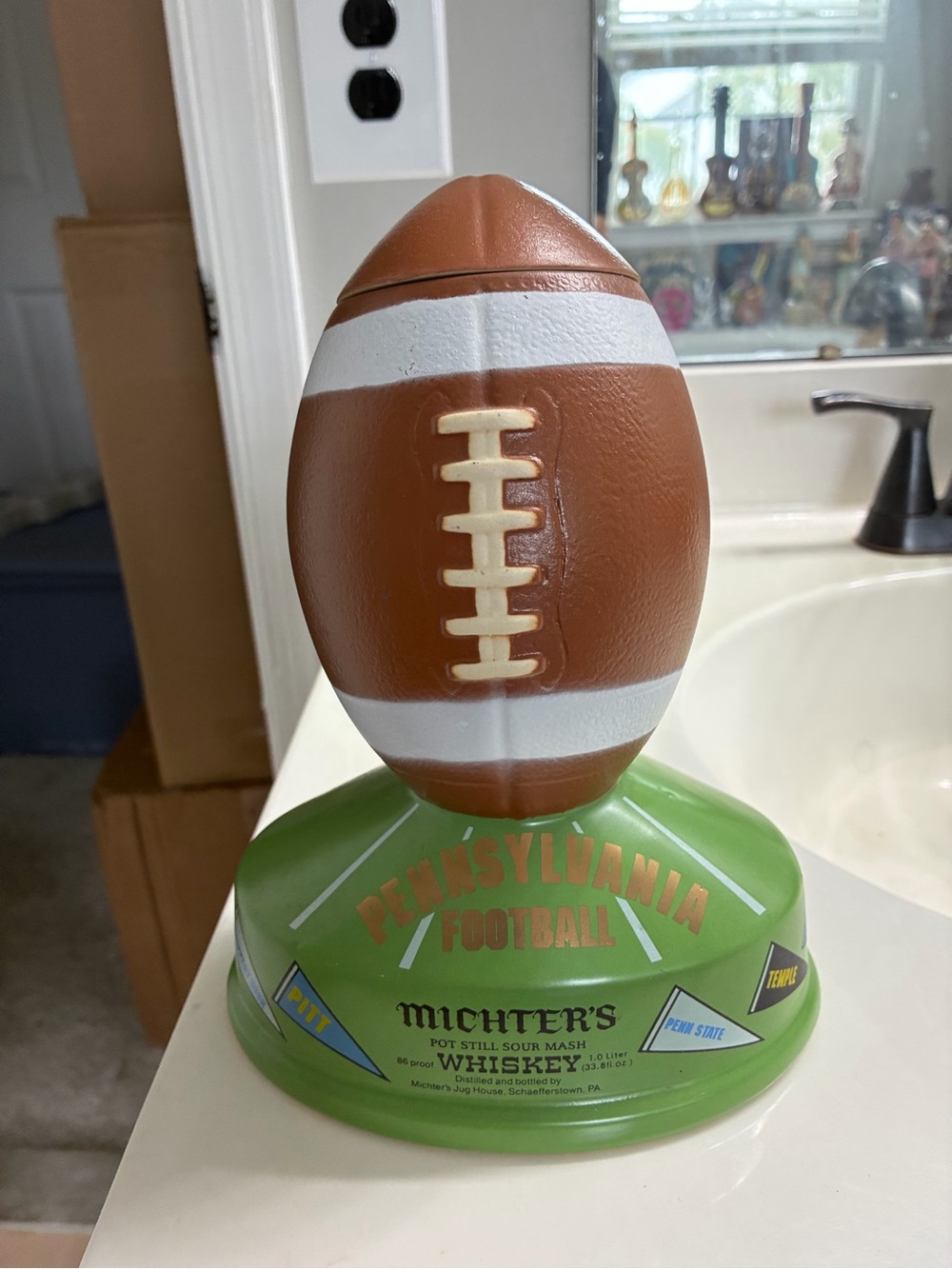 Vintage 1979 Michter's Pennsylvania Football Decanter - empty, display only.